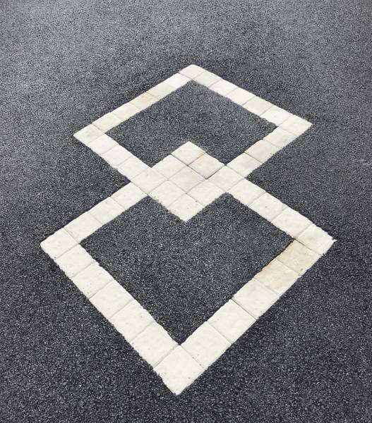 Motifs pavés dans son allée en enrobé